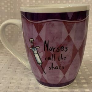 Purple Nurses Call the Shots mug. 4 inches tall.